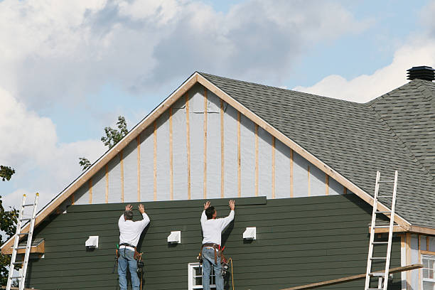 Professional Siding Installation technician working in Refton, PA
